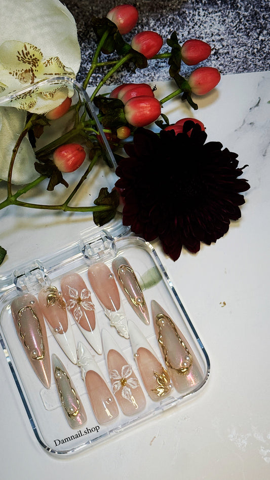 French tips with 3D chrome and flowers.
